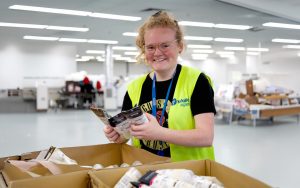 wallara logistics supporting 03 A Wallara participant sorting products at a packing station.